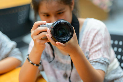Portrait of man photographing