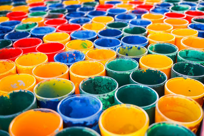 Full frame shot of colorful paint cans