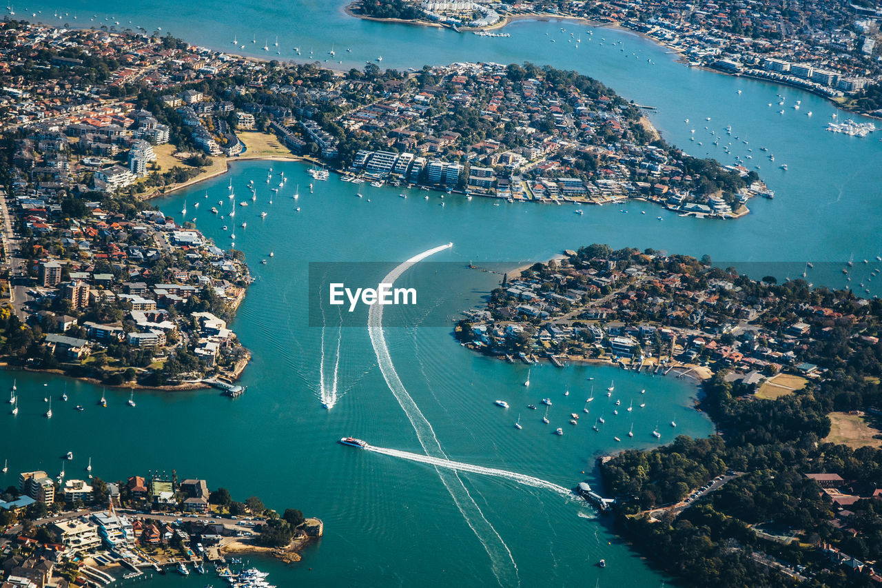 High angle view of city by sea