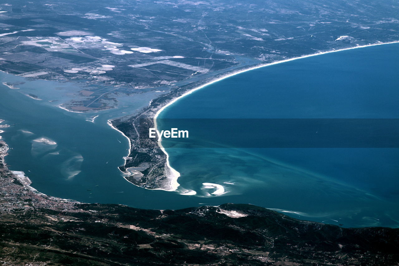 High angle view of sea and mountains