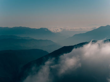 Scenic view of mountains against sky during sunset