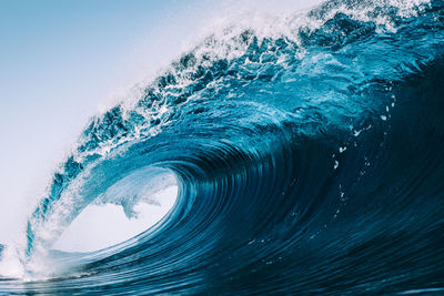 Scenic view of sea wave against clear sky